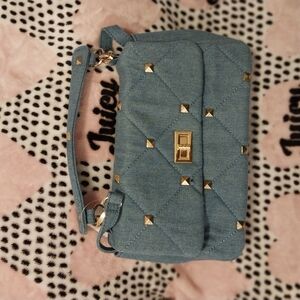 Stylish Blue Quilted Handbag with Gold Accents